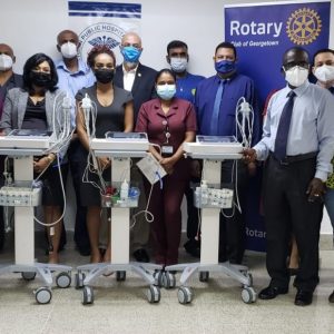 GBTI team up with Rotary Club of Georgetown to donate ECG machines to GPHC